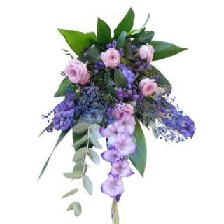 Flot bårebuket i blå og lilla farver - Holst Blomster Nexø